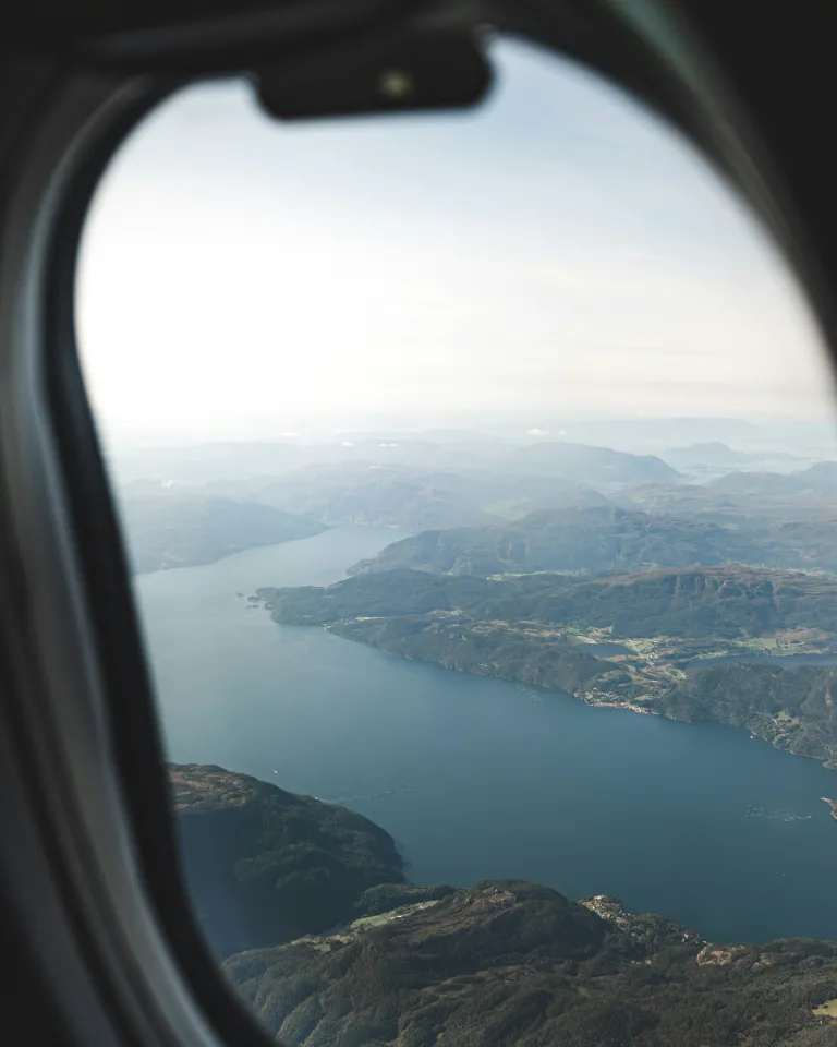 view of water and land from aircraft window